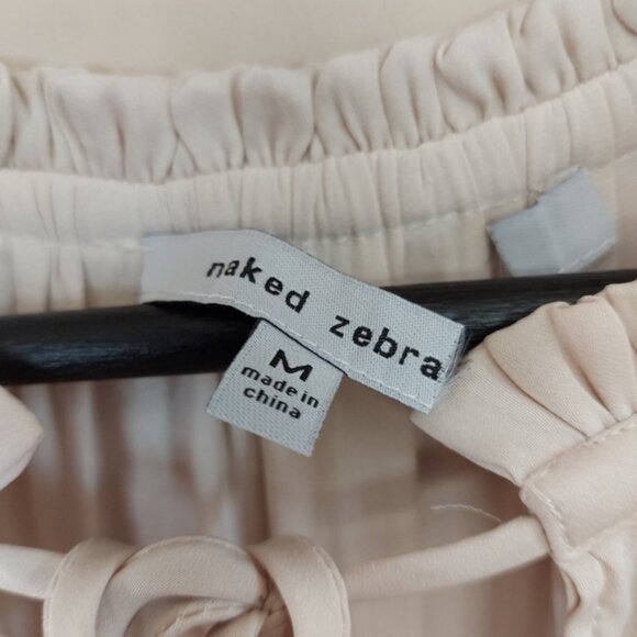 Naked Zebra blouse with tie front closure and ruffle detail on the neck sleeve - Picture 4 of 6